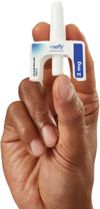 Hand holding neffy intranasal epinephrine